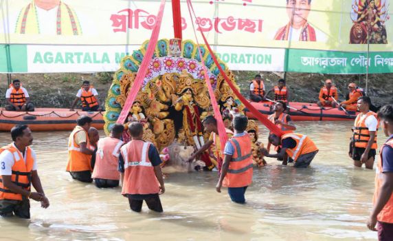 Immersion of idols marks end of Durga Puja.